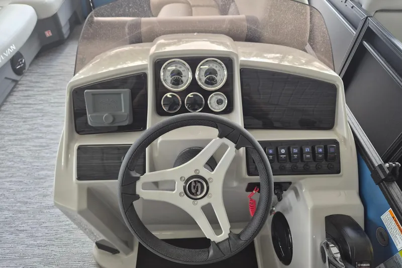 Slide: The Image of Steering console of 2026 Sylvan Mirage Fish 820 Party Fish boat with gauges and controls. - 6