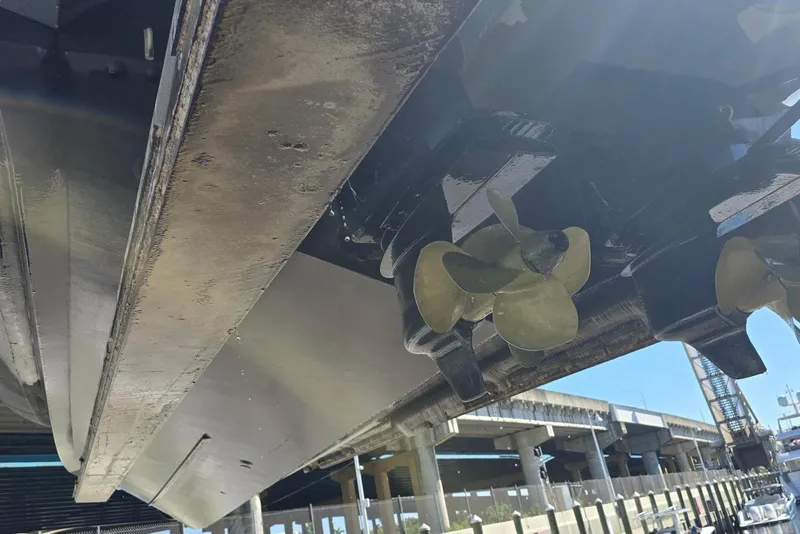Slide: The Image of Underwater view of 2019 SACS Rebel 40 boat propellers at a dock. - 47