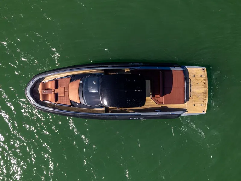 Slide: The Image of Top view of 2019 SACS Rebel 40 yacht on green water. - 5