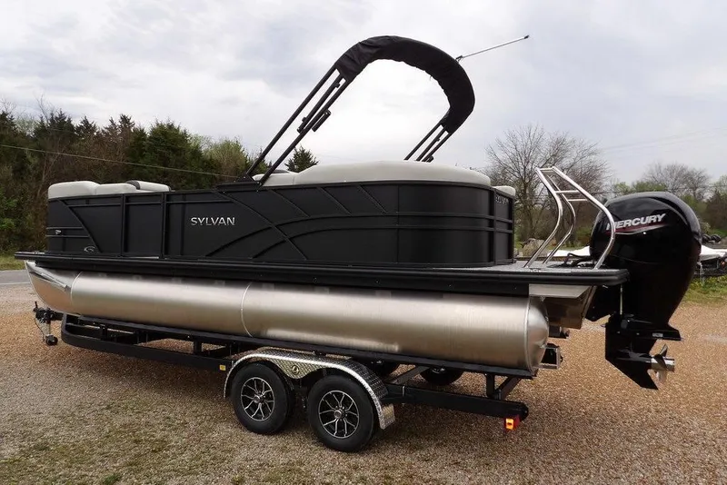 Slide: The Image of 2026 Sylvan 8522 LZ pontoon boat on trailer with Mercury outboard motor. - 15