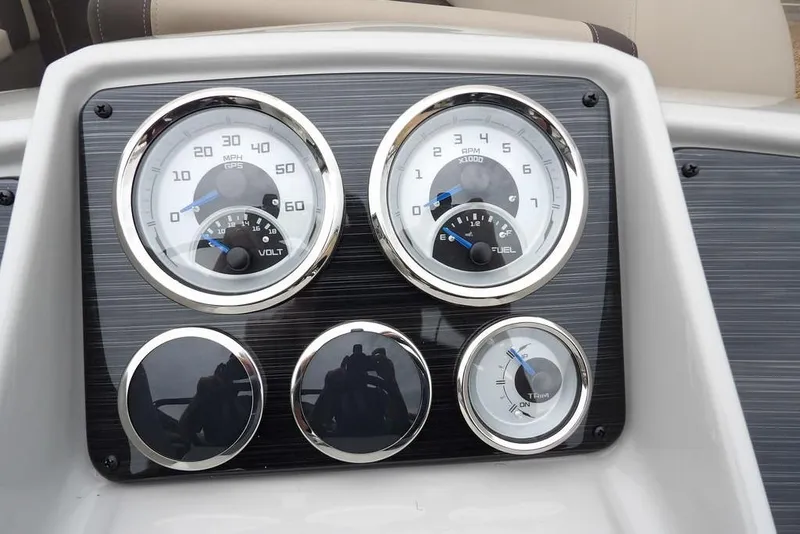 Slide: The Image of Dashboard of 2026 Sylvan 8522 LZ boat with speedometer and fuel gauges. - 20