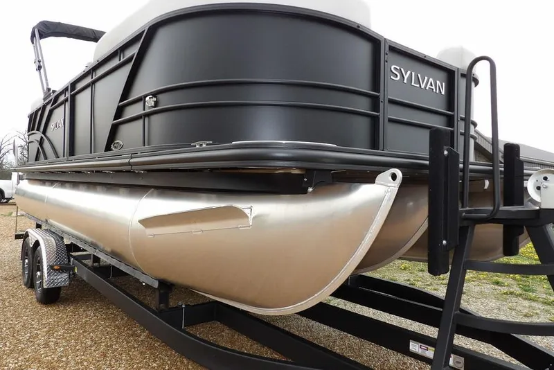 Slide: The Image of 2026 Sylvan 8522 LZ pontoon boat on trailer, black exterior, side view. - 35