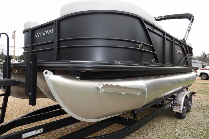 Slide: The Image of 2026 Sylvan 8522 LZ pontoon boat on trailer, black exterior, side view. - 42