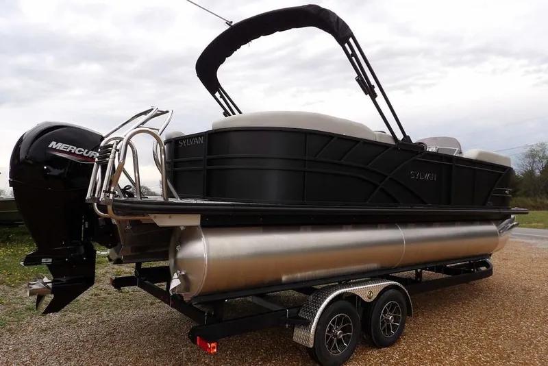 Slide: The Image of 2026 Sylvan 8522 LZ pontoon boat with Mercury outboard engine on trailer. - 7