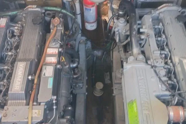 Slide: The Image of Engine room of a 2000 Luhrs Tournament 290 Open with Yanmar engines. - 16