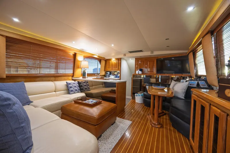 Slide: The Image of Luxurious interior of a 1998 Viking 50 Convertible yacht with elegant furnishings and wood accents. - 5