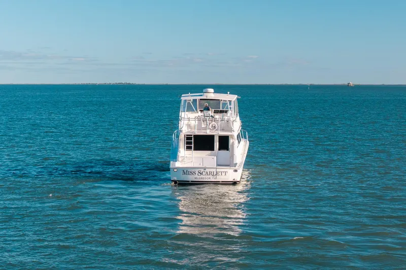 Slide: The Image of Viking 50 Convertible yacht cruising on open water, 1998 model. - 54