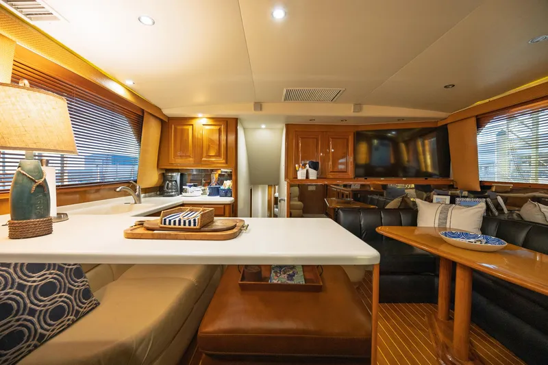 Slide: The Image of Luxurious interior of a 1998 Viking 50 Convertible yacht with modern amenities. - 8
