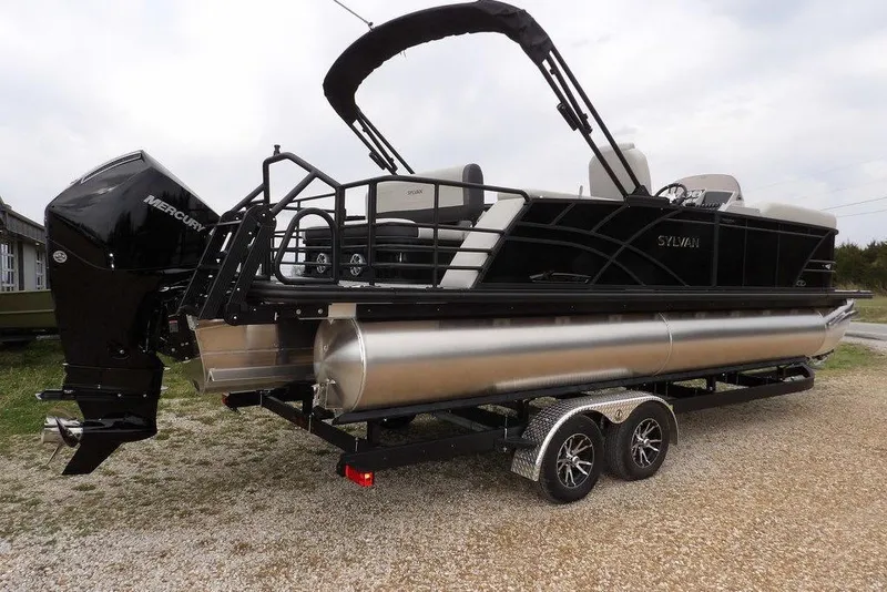 Slide: The Image of 2026 Sylvan X5 CLZ pontoon boat on trailer with Mercury outboard motor. - 11