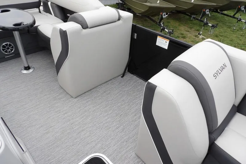 Slide: The Image of Interior of 2026 Sylvan X5 CLZ boat with gray seating and flooring. - 19
