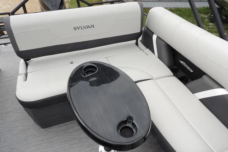 Slide: The Image of Luxurious seating area on 2026 Sylvan X5 CLZ boat with sleek table design. - 24
