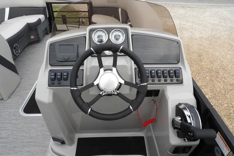 Slide: The Image of Steering console of 2026 Sylvan X5 CLZ boat with modern controls and dashboard. - 28