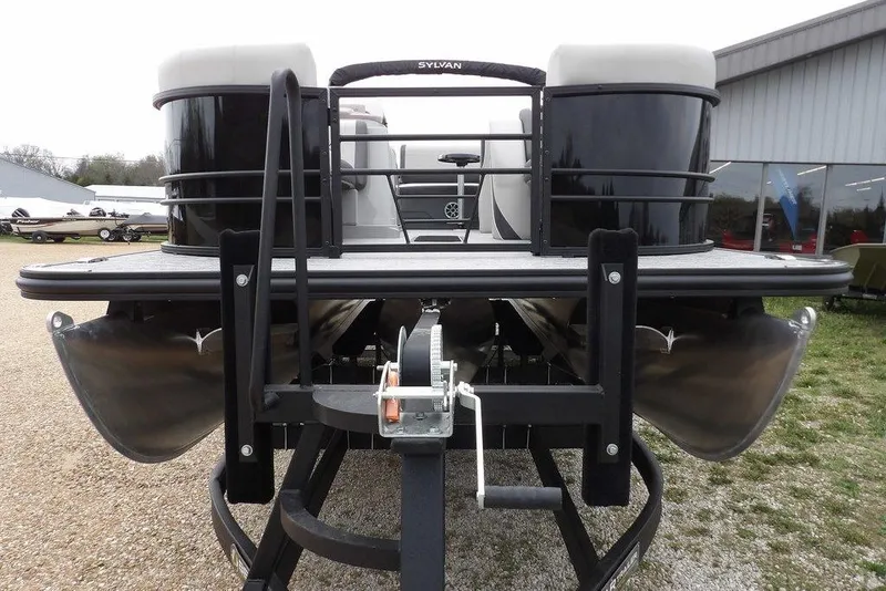 Slide: The Image of 2026 Sylvan X5 CLZ pontoon boat on trailer, front view, outdoors. - 3