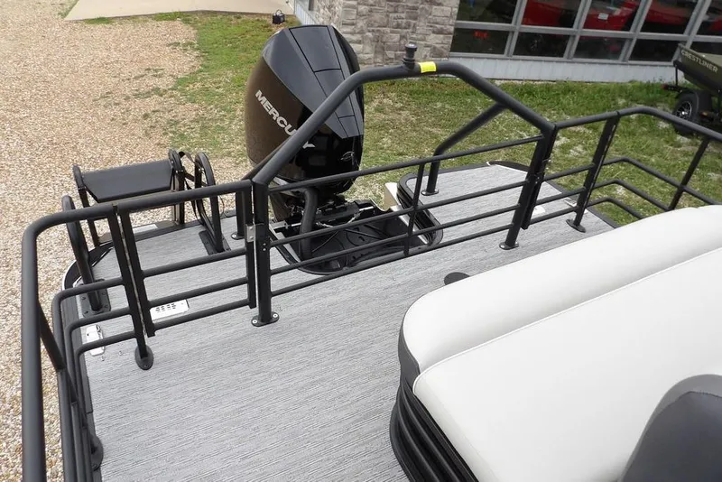 Slide: The Image of Rear view of 2026 Sylvan X5 CLZ boat with Mercury outboard motor. - 33