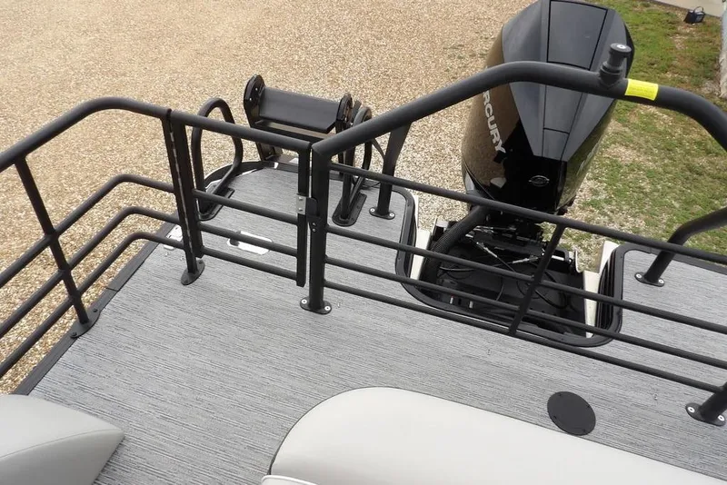 Slide: The Image of Rear deck view of 2026 Sylvan X5 CLZ boat with Mercury outboard motor. - 34