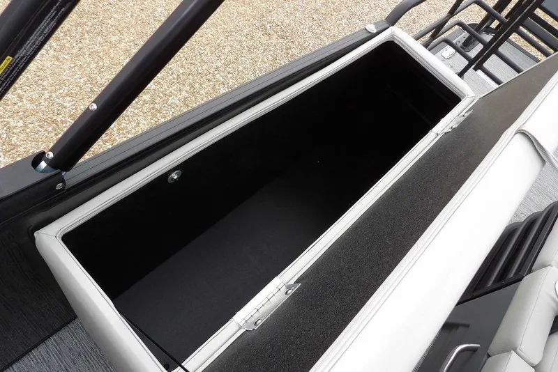 Slide: The Image of Open storage compartment in 2026 Sylvan X5 CLZ boat, showcasing spacious interior design. - 35