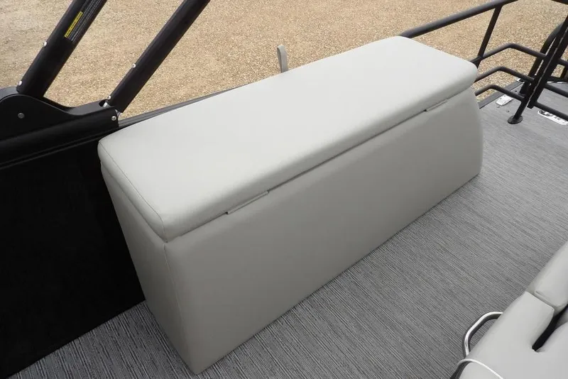 Slide: The Image of 2026 Sylvan X5 CLZ boat interior with gray cushioned bench seat. - 36