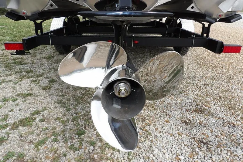 Slide: The Image of 2026 Sylvan X5 CLZ boat propeller on gravel surface. - 43