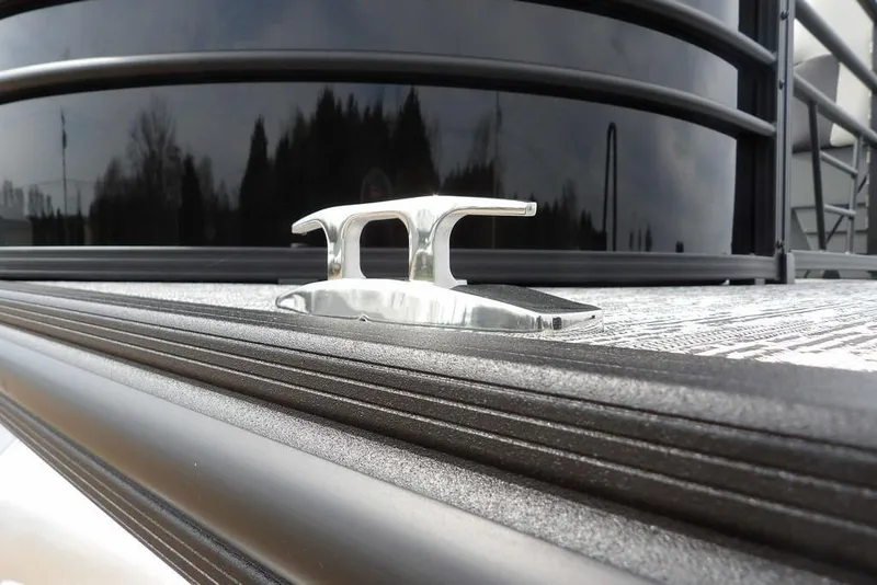 Slide: The Image of Close-up of a 2026 Sylvan X5 CLZ boat cleat on textured deck surface. - 48