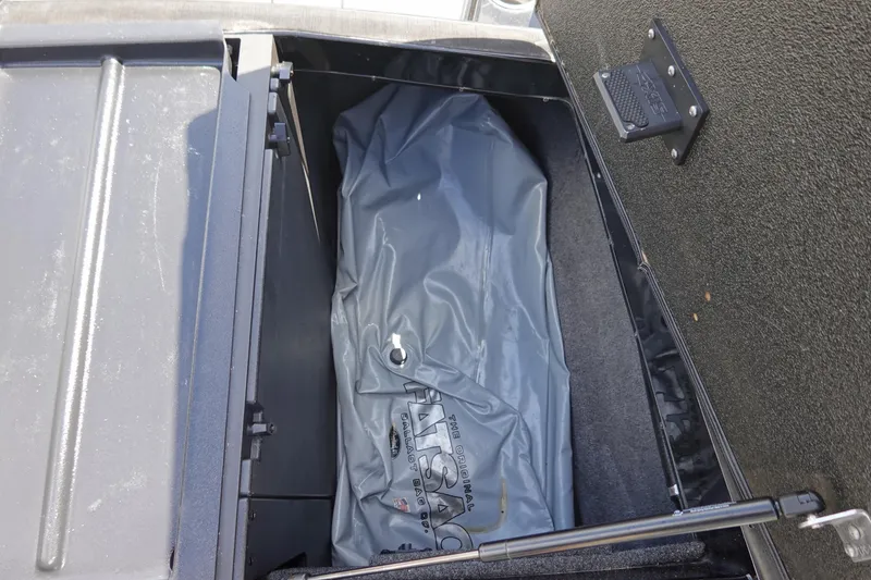 Slide: The Image of Storage compartment of 2019 Axis T23 boat with ballast bag inside. - 23