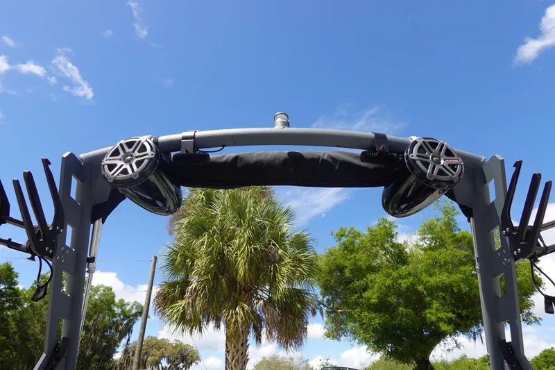 Slide: The Image of 2019 Axis T23 boat tower with speakers against a clear blue sky. - 24