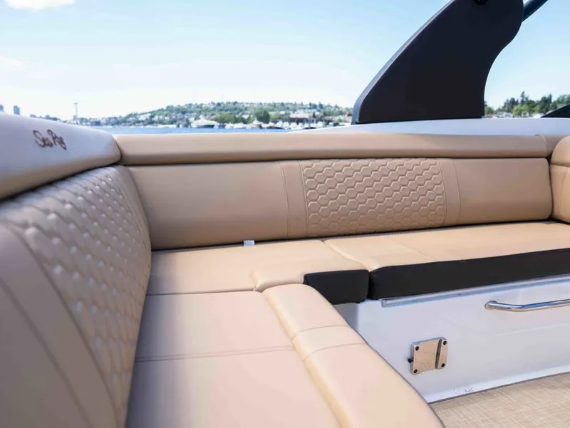 Slide: The Image of Interior of 2018 Sea Ray SDX 270 with beige upholstery. - 11