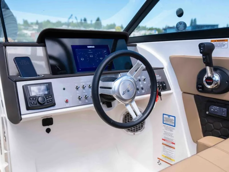 Slide: The Image of Interior view of 2018 Sea Ray SDX 270 boat cockpit. - 14