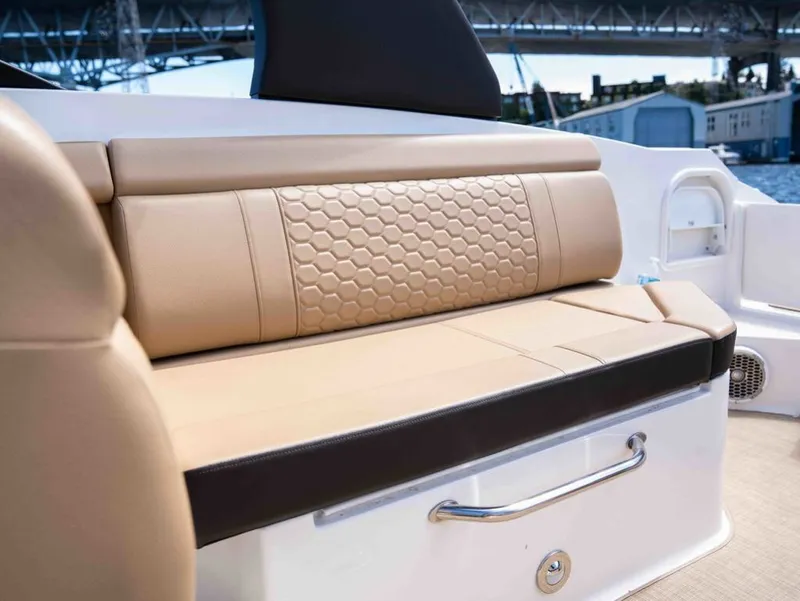 Slide: The Image of Luxurious seating on Sea Ray SDX 270 boat, model year 2018. - 18