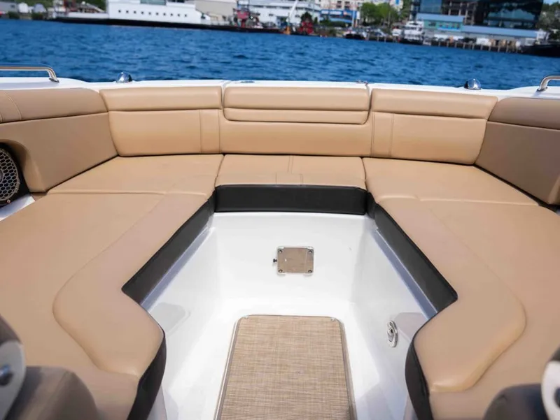 Slide: The Image of Interior of 2018 Sea Ray SDX 270 with beige seating. - 19