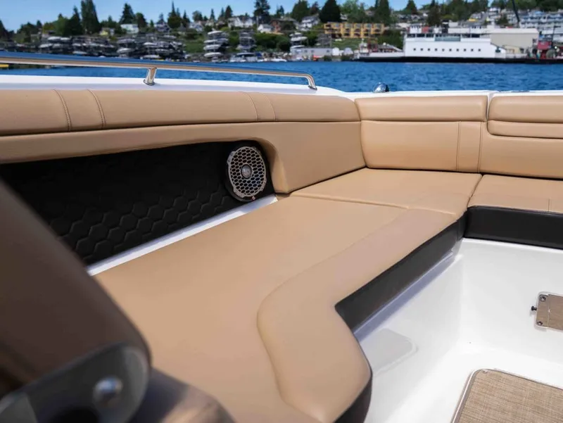 Slide: The Image of Interior of 2018 Sea Ray SDX 270 with beige seating. - 20