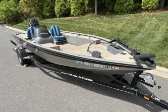 Slide: The Image of 2005 Tracker Tournament V-18 All Fish boat on trailer, parked on roadside. - 15