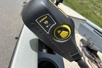 Slide: The Image of Close-up of a 2005 Tracker Tournament V-18 All Fish boat control panel. - 5