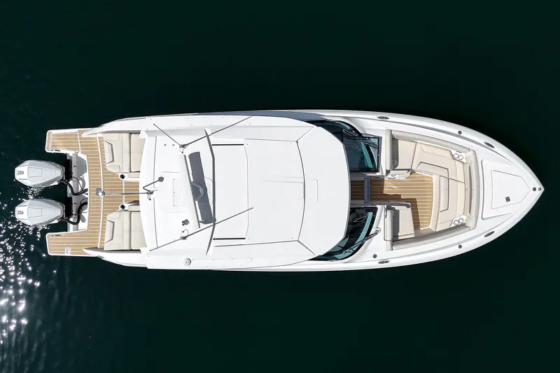 Slide: The Image of Aerial view of 2026 Tiara Yachts 34 LX, showcasing sleek design and dual engines. - 16