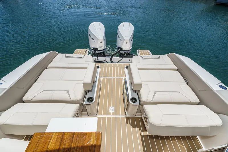 Slide: The Image of Luxury seating on 2026 Tiara Yachts 34 LX with dual Mercury outboards. - 39