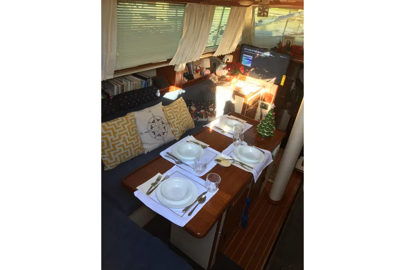 Slide: The Image of Stainless steel Magic Chef refrigerator in a 1973 CAL 2-46 boat interior. - 6