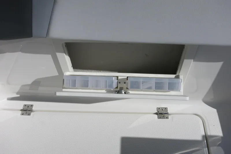 Slide: The Image of Storage compartment on 2026 Robalo R250 Center Console boat. - 25
