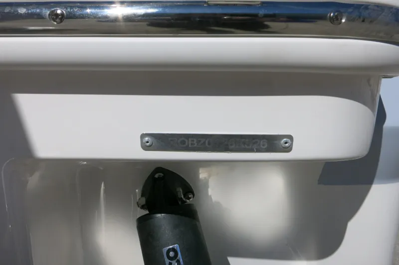 Slide: The Image of 2026 Robalo R250 Center Console boat detail with identification plate. - 29