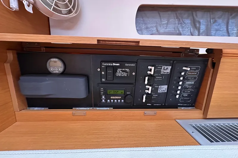 Slide: The Image of Electrical control panel on a 2015 Jeanneau Sun Odyssey 469 sailboat. - 21