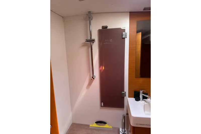 Slide: The Image of Bathroom interior of 2015 Jeanneau Sun Odyssey 469 yacht with shower and sink. - 23