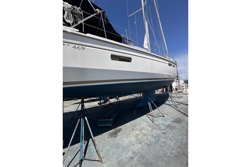 Slide: The Image of 2015 Jeanneau Sun Odyssey 469 sailboat on stands, ready for maintenance. - 38