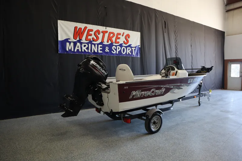Slide: The Image of 2013 MirroCraft 1416 Troller boat displayed at Westre's Marine & Sport showroom. - 5