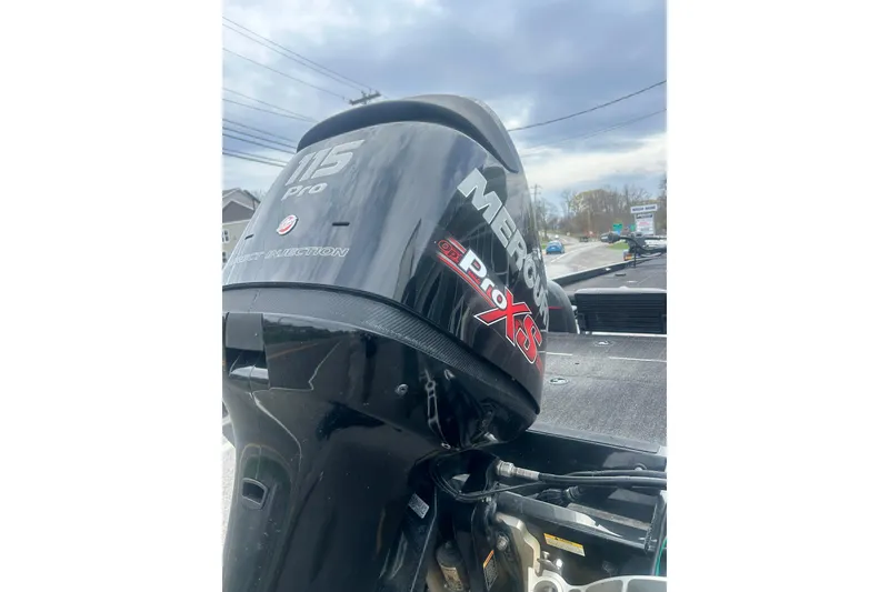 Slide: The Image of 2016 Ranger RT188 boat with Mercury 115 Pro XS engine, parked outdoors. - 8