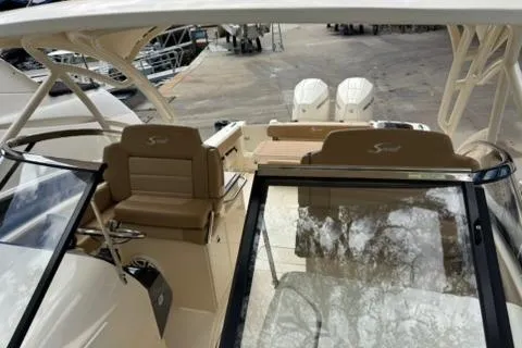 Slide: The Image of 2024 Scout 255 Dorado boat interior with dual seating and modern design. - 37
