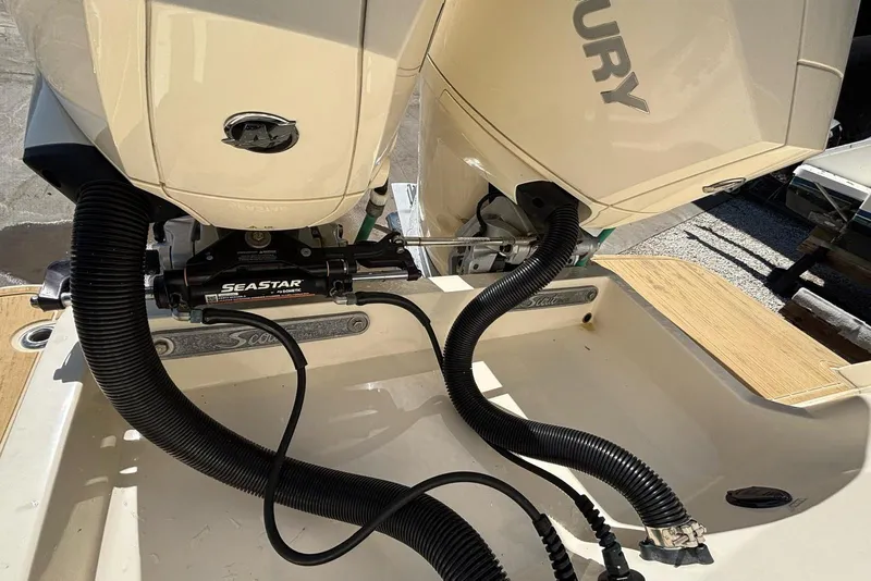 Slide: The Image of 2024 Scout 255 Dorado boat with dual Mercury outboard engines and SeaStar hydraulic steering. - 39