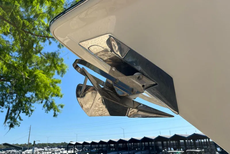 Slide: The Image of Close-up of 2024 Scout 255 Dorado boat anchor against a clear blue sky. - 6