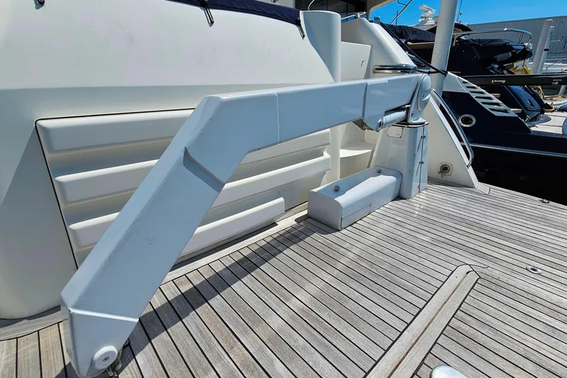 Slide: The Image of Sunseeker Manhattan 62 yacht deck with hydraulic gangway, 1998 model. - 10