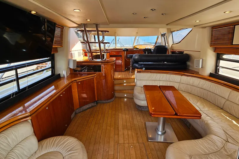 Slide: The Image of Luxurious interior of 1998 Sunseeker Manhattan 62 yacht with elegant wood finishes. - 15
