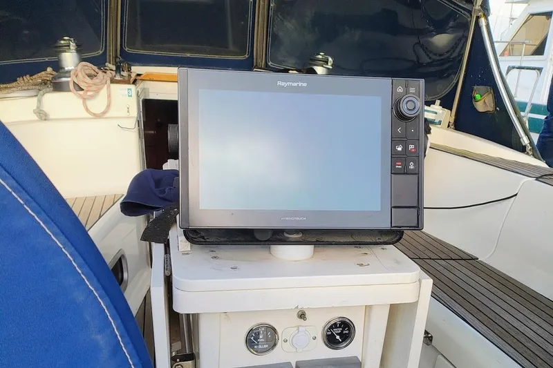 Slide: The Image of Raymarine navigation system on 2003 Bavaria 49 yacht cockpit. - 17