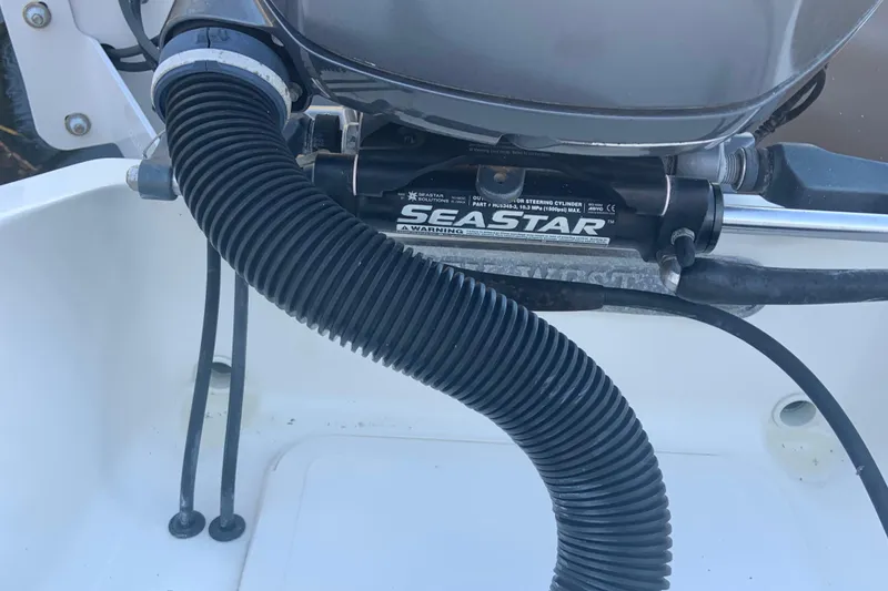 Slide: The Image of Close-up of 2016 Key West 239 DFS boat's steering mechanism and hydraulic system. - 18