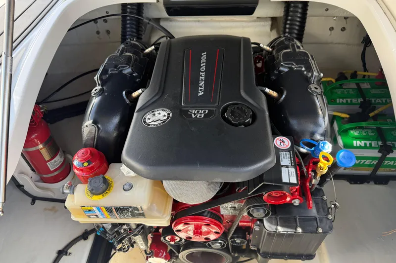 Slide: The Image of 2019 Chaparral 257 SSX engine compartment with Volvo Penta 300 V8 engine. - 20